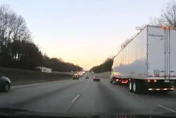 Semi truck driving on the road
