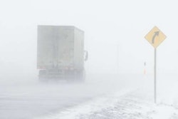 Truck driving in the snow