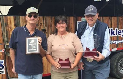 Left to right: Danny Haynes, who received a Million Mile Award; Angie Mollett and Loren Lux, Bulkley’s Local Driver of the Year. (Image Angie Courtesy of Bulkley Transport)