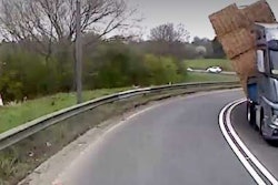 Truck hauling hay bales