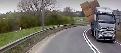 Truck hauling hay bales
