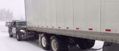 California Highway Patrol gives trucker a push in the snow