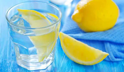 Lemon wedges and glass of water