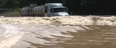 Tanker truck driving through high waters in Louisiana