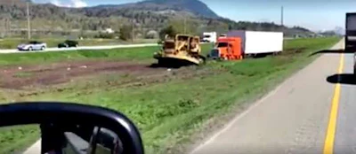 A D9 dozer is needed to get this truck on its way again.