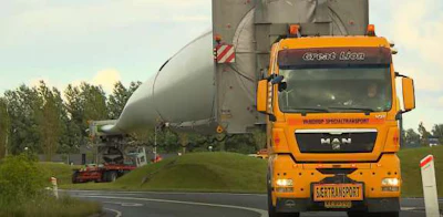 Semi truck driving on the road