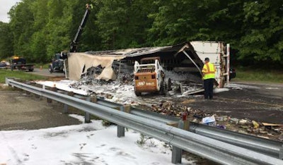 Fire destroyed this trailer and its cargo of liquor Monday, May. 1 (Photo by Lt. Jason Elmore)