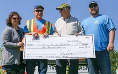 Left to right: Jamie Benson, SMC/TDC Committee Chairman, of FedEx; Brian Ambrose, Jim Janson Lynden, and ATA Board President Joey Crum at the Alaska Truck Driving Championships. (Image Courtesy of Alaska Trucking Association)