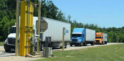 Trucks going through an inspection