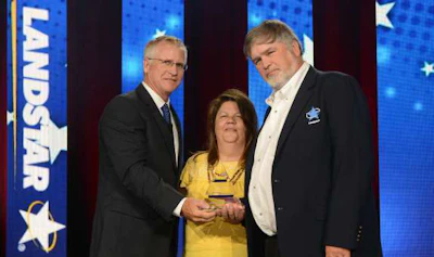 Conrad “Ray” Price (right) with Landstar President and CEO Jim Gattoni (left) when Price received the award during the Landstar BCO All-Star Celebration held in Nashville.