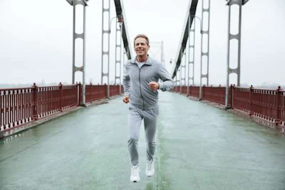 Man jogging on a bridge
