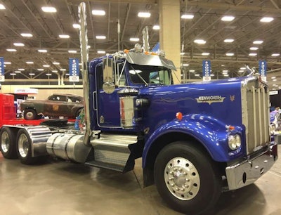 A 1972 Kenworth W900A extended hood is part of the American Truck Historical Society display. It has a Detroit 12V71 engine and belongs to Bobby Robinson of Waco, Texas.