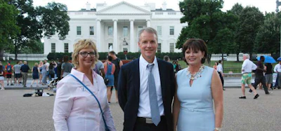 Sherri Garner Brumbaugh, left, with ATA VP Bill Sullivan and Greene Group CEO Tana Greene.