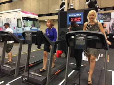 2016 Overdrive's Most Beautiful winner Brita Nowak gets her steps in at the GATS Progressive booth....