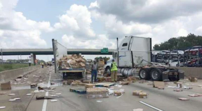 Frozen pizzas were strew across I-30 Wednesday after a tractor/trailer struck an overpass. (Arkansas DOY photos)