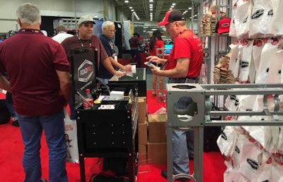 GATS attendees purchase gear at the RoadPro booth.