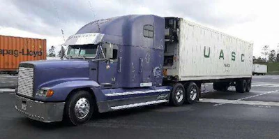 Cherryl Lannigan's 1998 Freightliner FLD, named 'Purple Passion.'