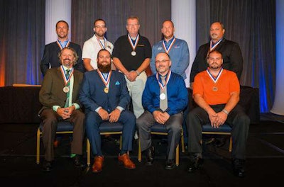 From left to right rear: Gary Noyes, Adam Caughey, Glenn Anderson, Matt Baker, and Larry Wilson. From left to right front: Danny Duke, Anthony Garcia, Joaquin Cuadras, and Andrew Spindler.