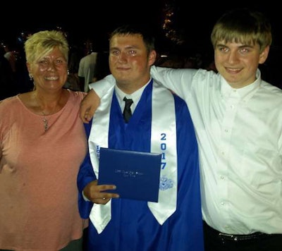 Paula and her sons, Cameron and Christopher, at Cameron’s high school graduation.