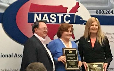 Deborah Paskman (middle) honored for her long safe driving record by the National Association of Small Trucking Copanies