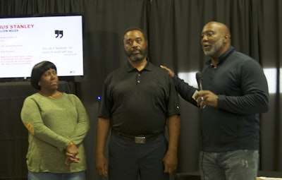 Nephus Stanley, center, is recognized for reaching two million safe-driving miles. He was joined by his wife, Marcia, left.