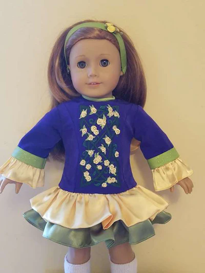 This design is one of Oeseburg’s more detailed Irish step dance doll dresses. (Image Courtesy of Amy Oeseburg)