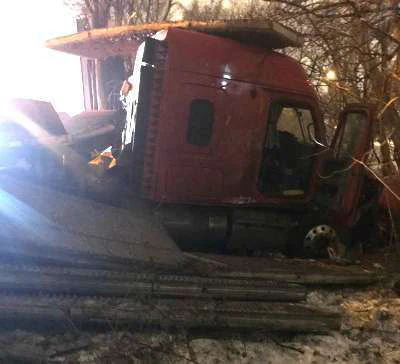 2013 Freightliner pulling a flatbed trailer involved in an accident on I-80-94 in Indiana Sunday (Indiana State Police photos)