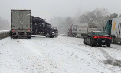 Snow falls in North Carolina (Photo by North Carolina DOY)