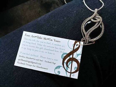 Shult leaves her artwork behind as part of the 'Art Abandonment' project, where artists leave their work in public spaces for others to find and keep. (Image Courtesy of Natalie Shult)