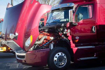 Students were able to get a look under the hood during the transportation career day. (Image Courtesy of Eau Claire High School Facebook Page)