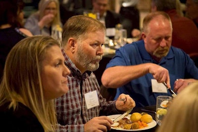 Driver of the Month Kenny Williams enjoys dinner during the banquet. (Image Courtesy of Maverick)