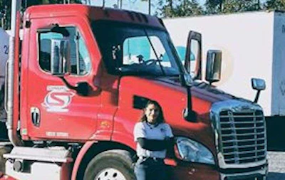Nancy Myers and her Syngery Fuel Transport company truck.