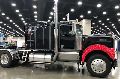 This 1977 Kenworth has red detailing in the front.