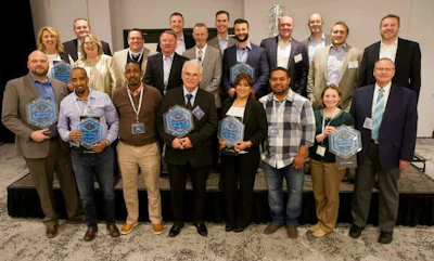 The carrier-of-the-year award winners this year with C.H. Robinson staff.