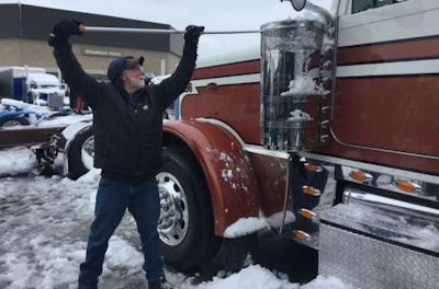 Tim Brandow cleans off a PKY Truck Beauty Contest entry