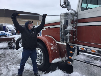 Tim Brandow cleans off a PKY Truck Beauty Contest entry