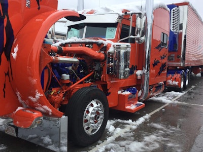 One of the many truck show entries needing to be cleared of snow Wednesday