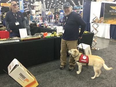 Cliff Price with his service dog Meeko, a Korean Jindo he rescued six years ago.