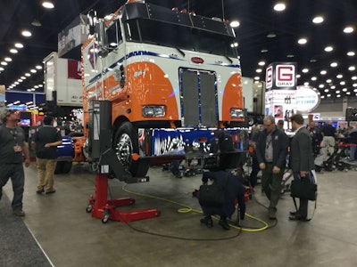 Peterbilt COE on jacks on the show floor