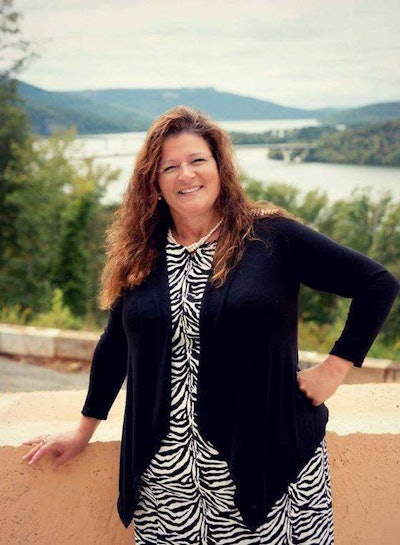 Shannon Blom at Nickajack Lake. She loves traveling and meeting new people through trucking. (Image Courtesy of Shannon Blom)