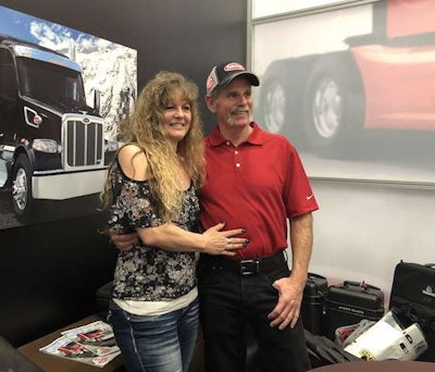 Rick McClerkin, right, won a new Peterbilt at MATS. He was accompanied by his fiancé, Kathy Cantaloube, right.