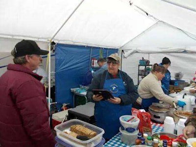 Janet McNeil stays so busy running the “Cause We Can” Cafe that sometimes she doesn’t actually make it into the truck show.