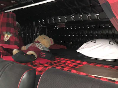 The truck features a bunker factory sleeper.