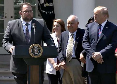Werner’s Derek Leathers speaks in the White House Rose Garden today as President Trump looks on.