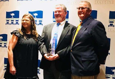 Ronnie Luckadoo, center, was named South Carolina’s Grand Champion at the state’s trucking championship. (Image Courtesy of South Carolina Trucking Association/Facebook)