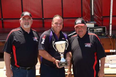 From left to right: California Trucking Association First Vice President Joe Giammona of JSG Trucking, Grand Champ Hobie Eirich and Rodney Farley, state finals chair of Griley Air Freight. (Image Courtesy of California Trucking Association)