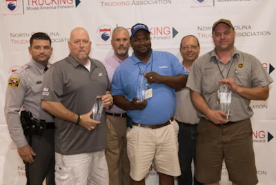 Pictured from the left are NCSHP D.J. Maffucci, third place tanker class winner Allen McNeely of ABF Freight, NCTA Chairman Gerald Myers, second place tanker class winner Leslie Barden of Smithfield Hog Production, TDC Chairman Alan Darr and first place tanker class winner Andrew Davis of UPS. (Image Courtesy of North Carolina Trucking Association)
