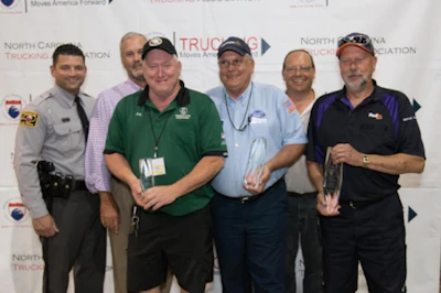 Pictured from the left are NCSHP D.J. Maffucci, NCTA Board Chairman Gerald Myers, third place sleeper berth winner Joey Weavil with Old Dominion Freight Line, second place sleeper berth winner Christopher D. Serviss with Walmart Transportation, TDC Chairman Alan Darr and first place sleeper berth winner Jimmy Whitley with FedEx Ground. (Image Courtesy of North Carolina Trucking Association)
