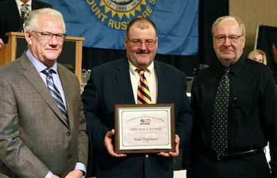 Wade Wagemann, center, was named South Dakota’s Grand Champion. (Image Courtesy of Jerry Cudmore)