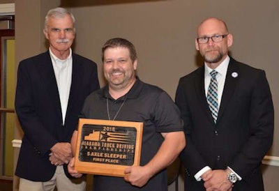 FedEx Freight's Robert Cottingham, center, won first place in the Sleeper Berth class. (Image Courtesy of Alabama Trucking Association/Facebook)